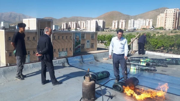 عملیات اجرای 6 هزار مترمربع عایق رطوبتی بام (ایزوگام)  4